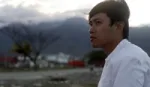 Winarto-Anggun Wicaksono looking thoughtful onto the damage caused by the earthquake in Palu, Indonesia