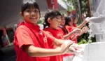 Schoolchildren washing their hands